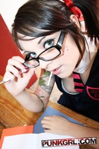 Tattooed cute schoolgirl