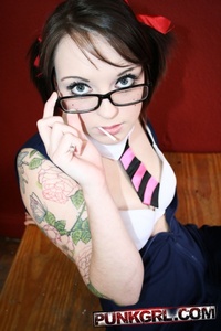 Tattooed cute schoolgirl