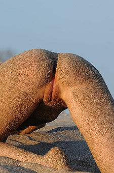 Teen girl posing at the beach