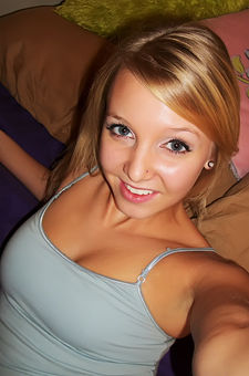 Blonde girlfriend takes selfshot pictures