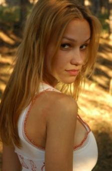 Busty babe in outdoors