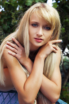 Nika Poses Nude In The Garden